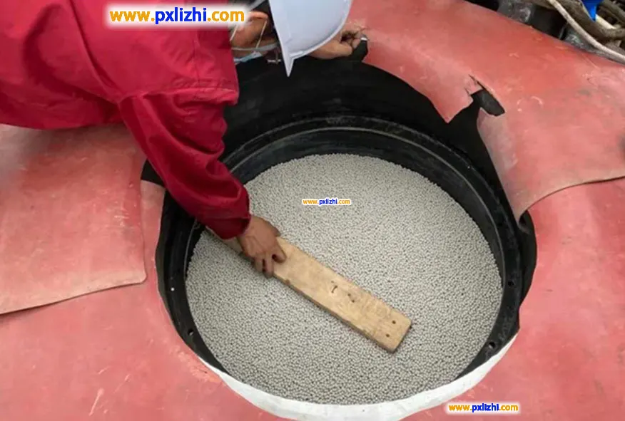 Inert ceramic balls are used to level it